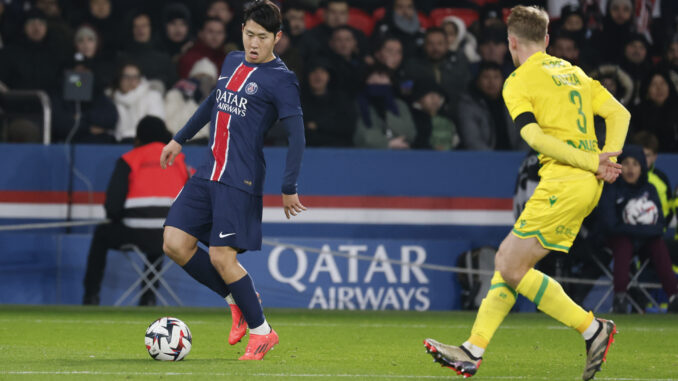 PARIS, FRANCE - NOVEMBER 30: Lee Kang In #19 of Paris Saint-Germain controls the ball against Nicolas Cozza #3 of FC Nantes during the Ligue 1 match between Paris Saint-Germain and FC Nantes at Parc des Princes on November 30, 2024 in Paris, France. (Photo by Catherine Steenkeste/Getty Images for Qatar Airways)